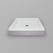 White Acritec regular profile single threshold shower base with center drain in a standard alcove shower setup