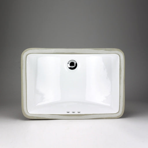 White rectangular Acritec undermount ceramic basin with curved bottom installed under a unique countertop