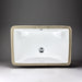 White rectangular Acritec undermount ceramic basin with curved bottom beneath a modern countertop
