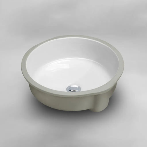 White round Acritec undermount ceramic basin installed under a contemporary countertop