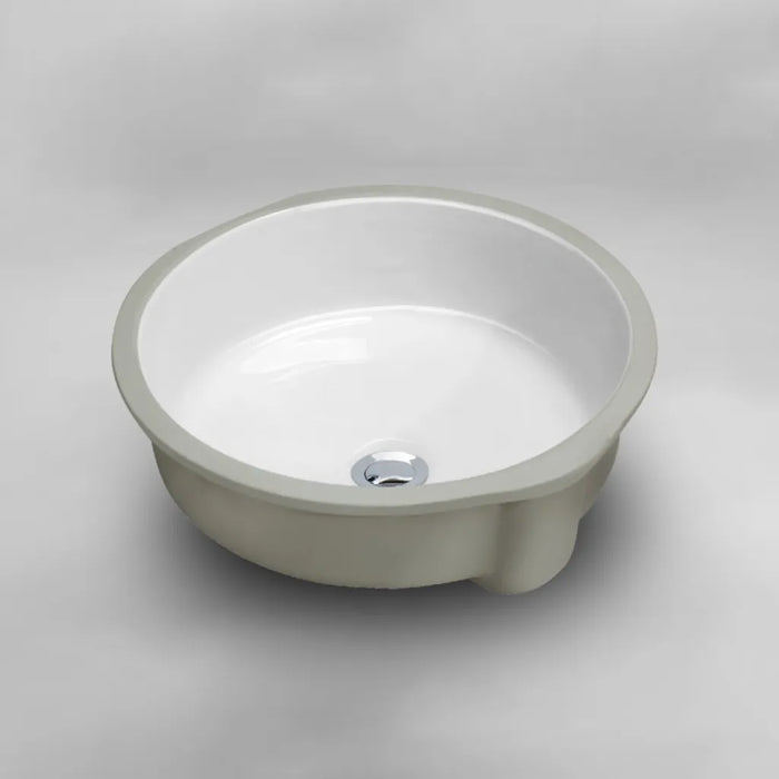 White round Acritec undermount ceramic basin installed under a contemporary countertop