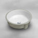 White round Acritec undermount ceramic basin installed under a contemporary countertop