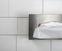 Frost 180 stainless steel facial tissue dispenser in use