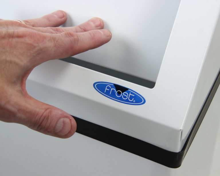 Frost 303 waste receptacle in use, showing white epoxy swing top function