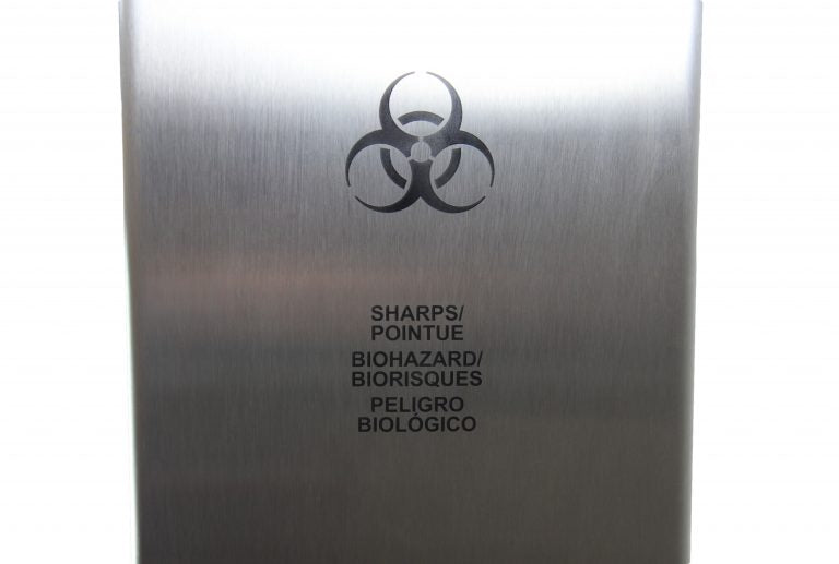 Side view of Frost 878 sharps disposal with stainless steel finish