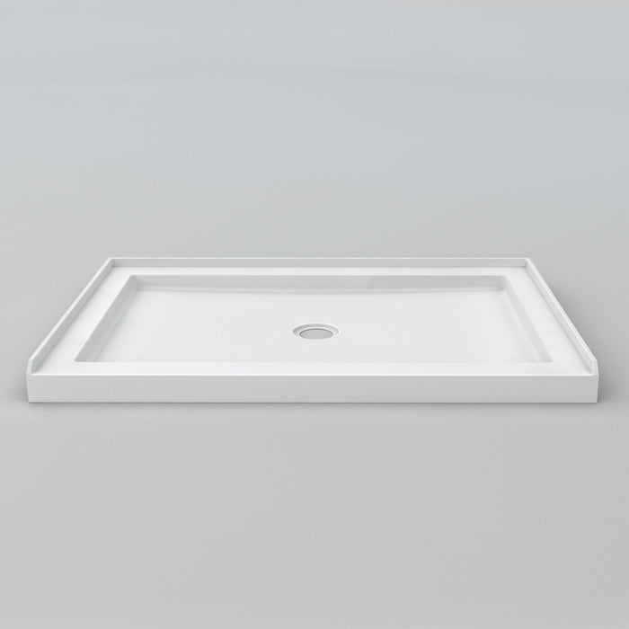 White Acritec low profile single threshold shower base with center drain in a modern alcove installation