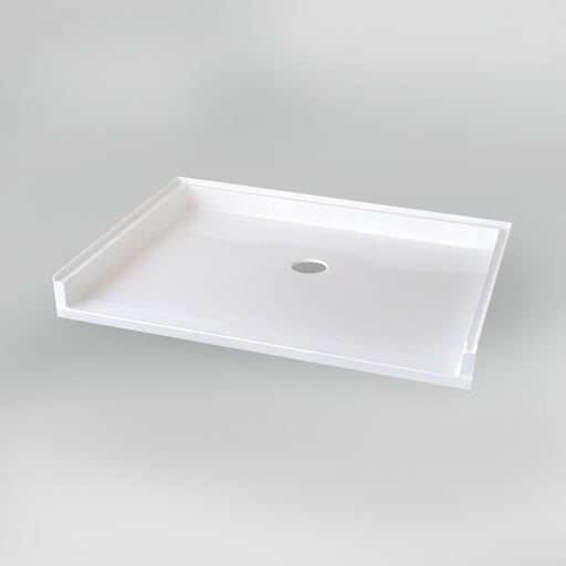 White Acritec barrier free single threshold shower base with center drain and ultra-low profile in an accessible bathroom