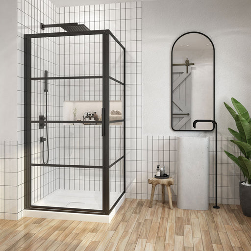 Acritec Ebony Series framed pivot shower door in matte black on double threshold base with tempered glass panels, Installed Acritec Ebony double threshold enclosure showing reversible design and easy-clean features in modern bathroom