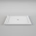 White Acritec minimalist double threshold shower base with center drain in a modern ultra-low installation