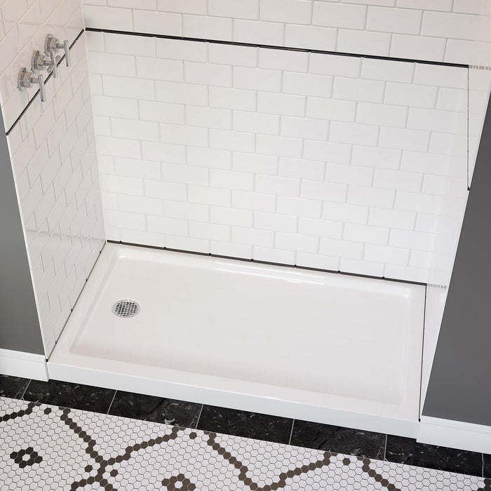 Overhead view of versatile Acritec single threshold end drain shower pan in a renovated bathroom setup