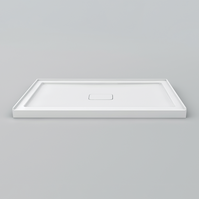 White Acritec covered drain single threshold shower base with center drain and recessed cap in a modern low profile installation