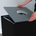 Close-up of full-opening black lid on Spectrum waste bin