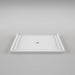White Acritec minimalist single threshold shower base with center drain and ultra-low profile in a contemporary bathroom