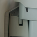 Rise wall-mounted single bin in narrow hallway or washroom